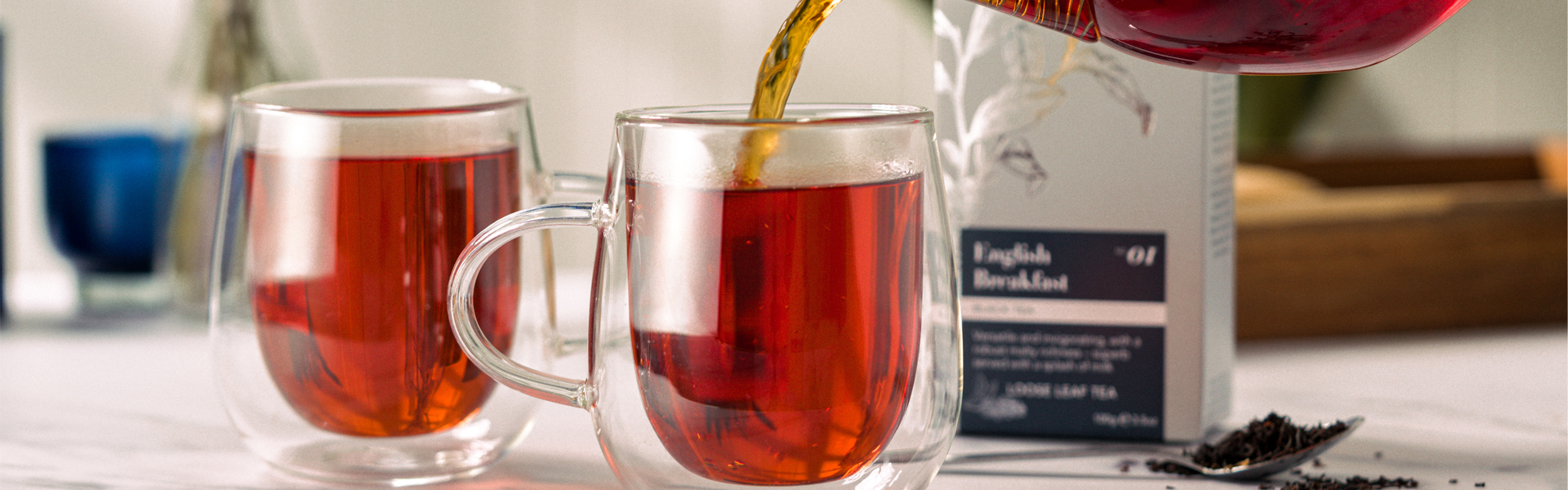 Whittard of Chelsea English Breakfast Tea Being Poured Into Glass Mug